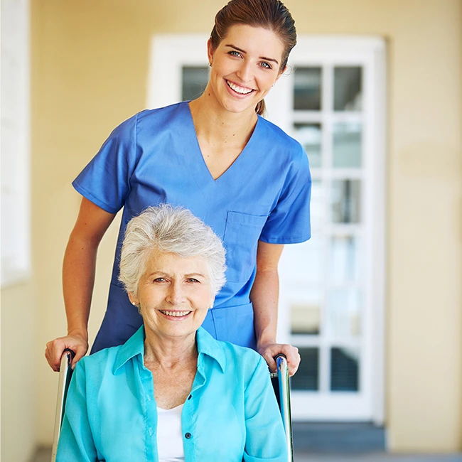 elderly woman with compassionate caregiver